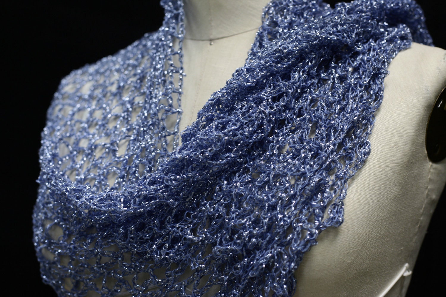 Blue shawl, full view of the hand-crocheted piece.