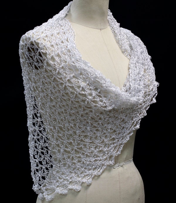 White shawl, full view of the hand-crocheted piece.
