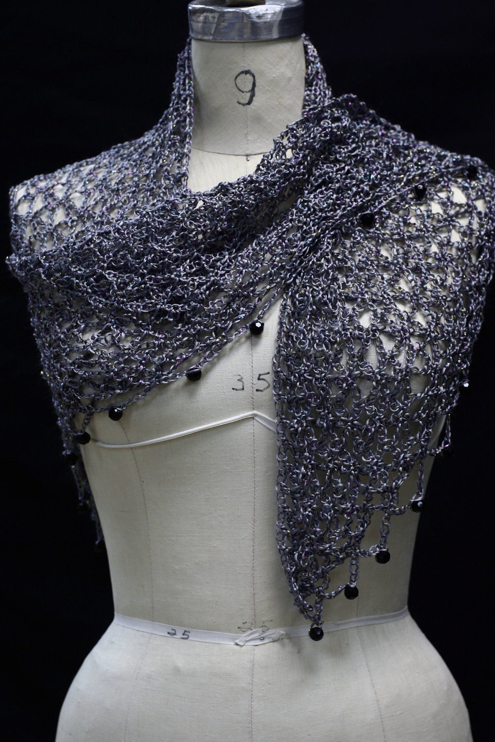 Gray shawl, full view of the hand-crocheted piece.