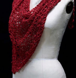 Red shawl draped to show how it falls over the shoulders.