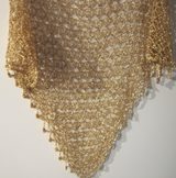 Gold Shawl — Close-up of the champagne gold crochet openwork and beaded edge of the shawl.