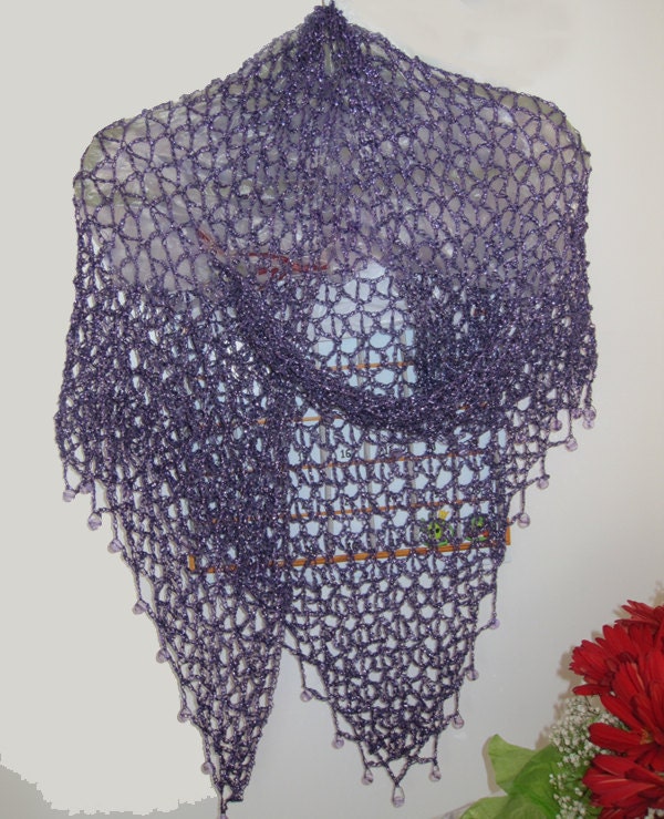 Plum purple shawl draped to show how it falls over the shoulders.