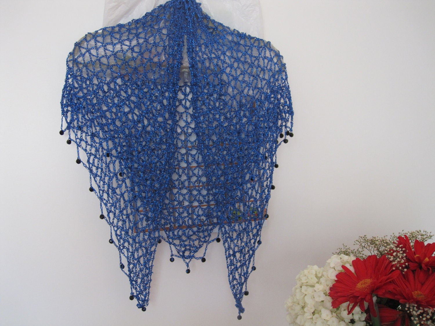 Blue shawl, full view of the hand-crocheted piece.