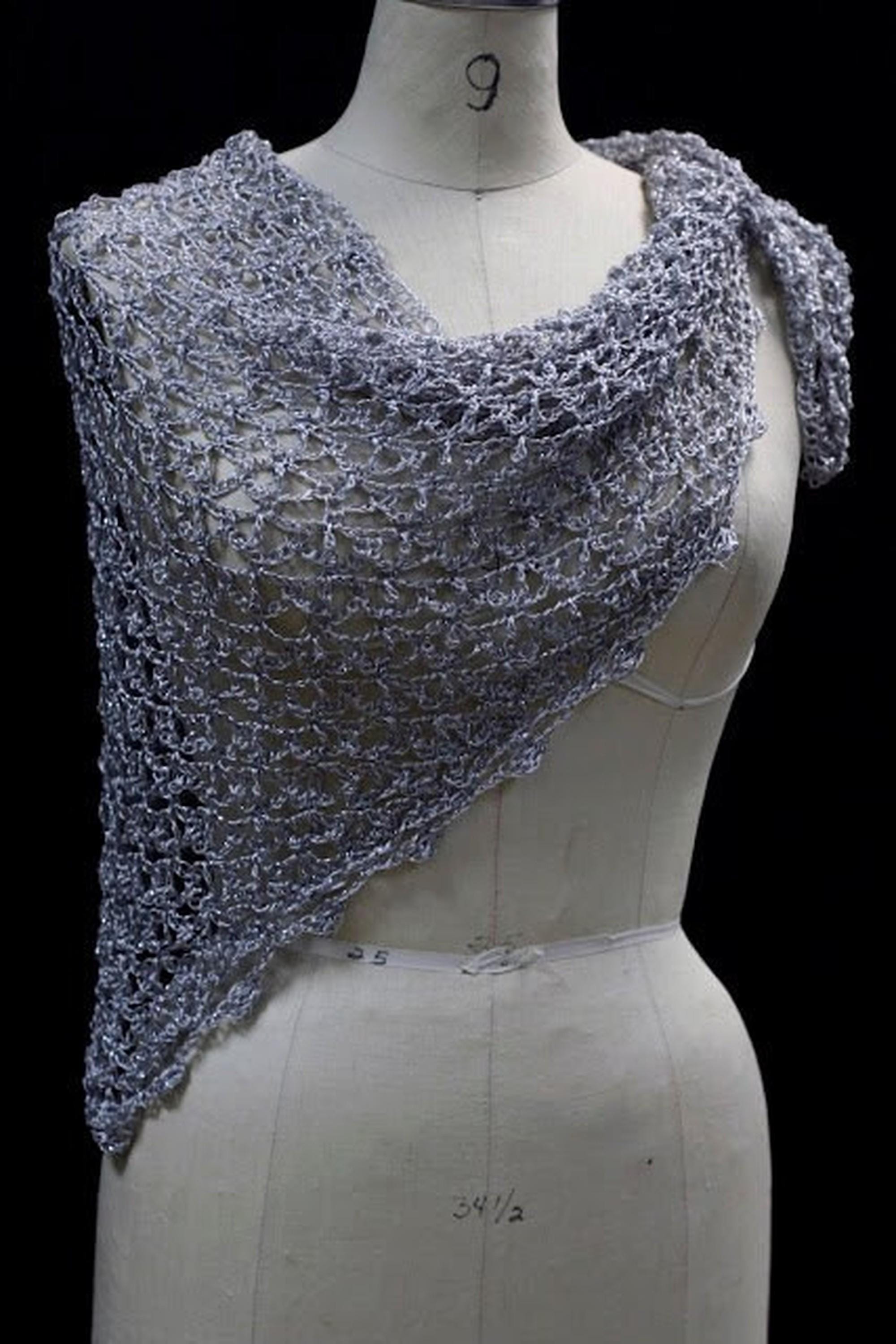 Silver shawl, full view of the hand-crocheted piece.