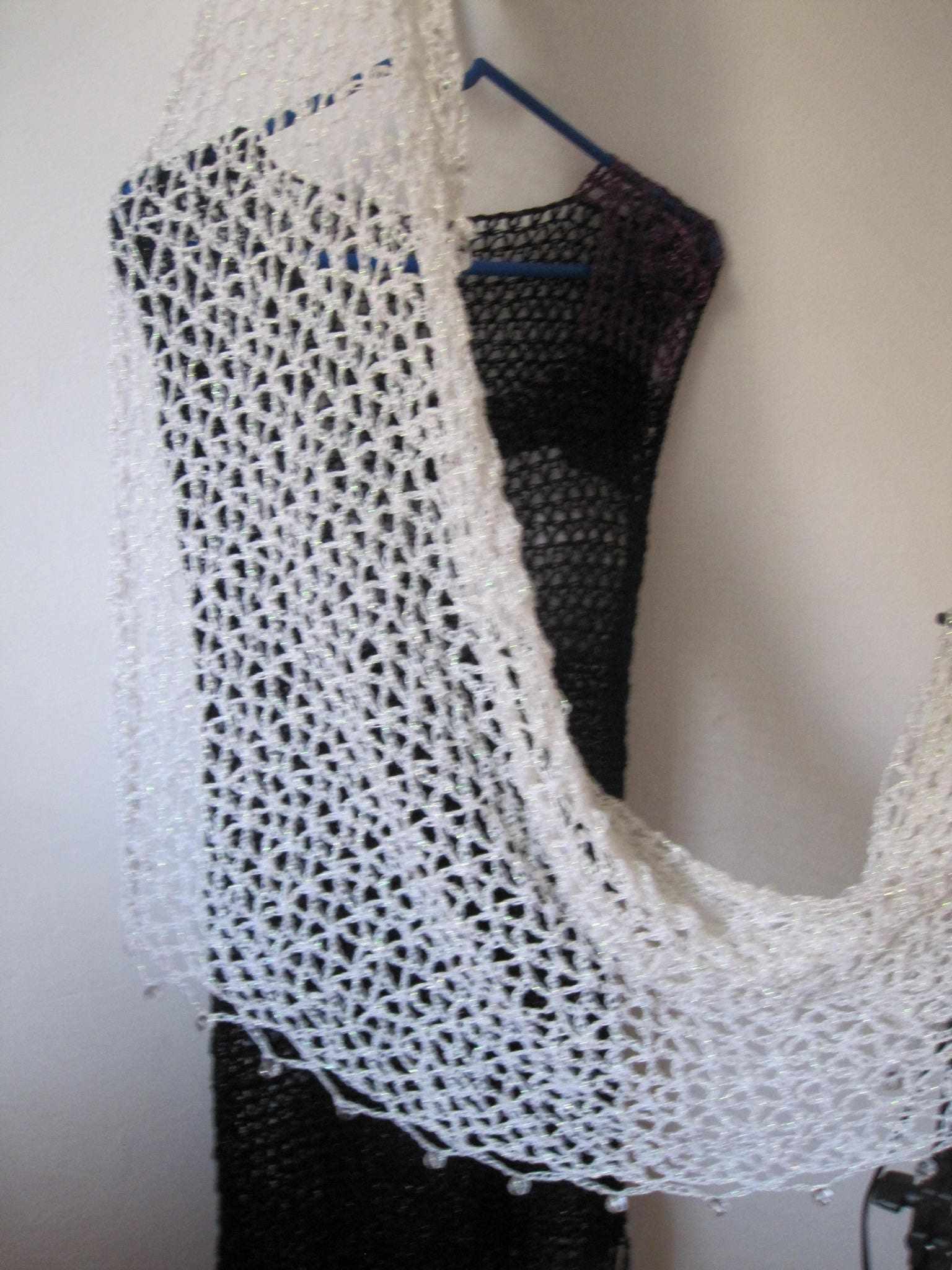 Cream shawl, full view of the hand-crocheted piece.
