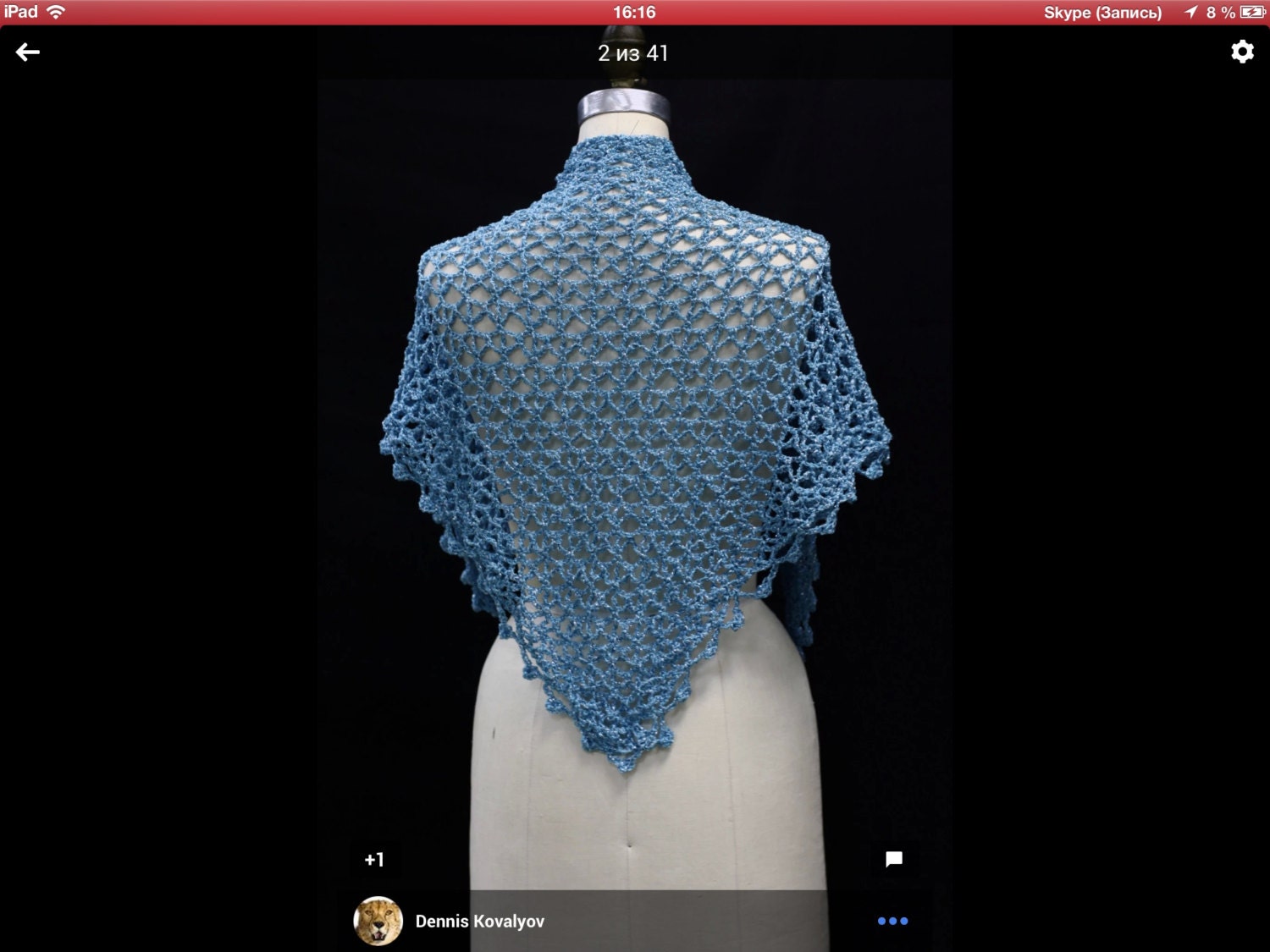 Light blue shawl draped to show how it falls over the shoulders.