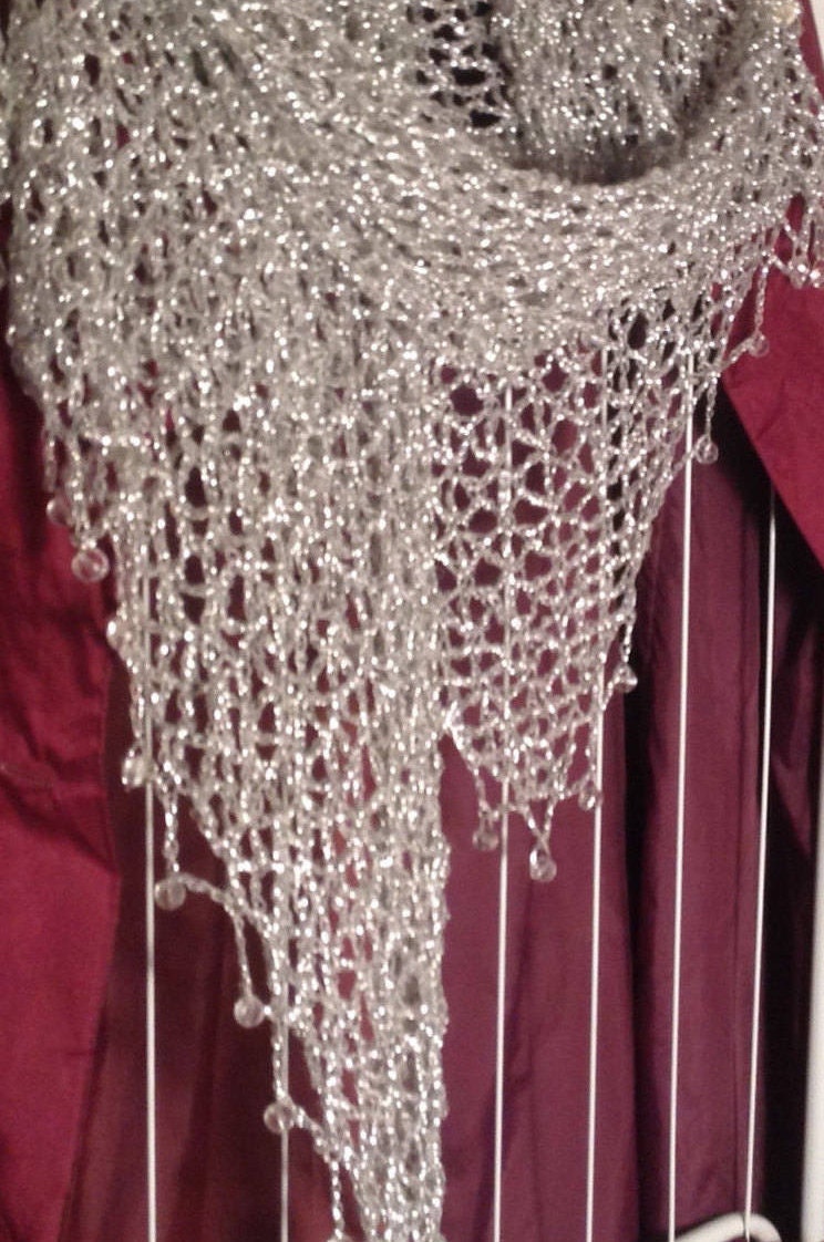 Silver shawl, full view of the hand-crocheted piece.