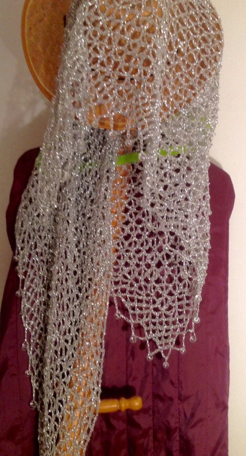 Silver shawl, full view of the hand-crocheted piece.